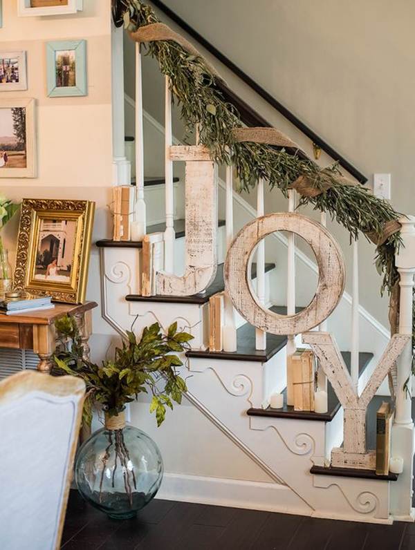 Staircase decorated for Christmas with rustic style