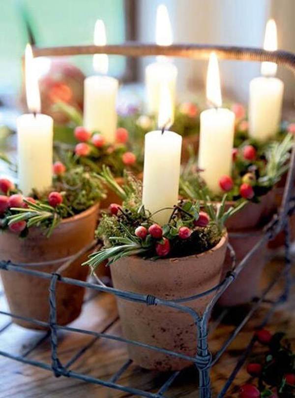 Christmas table centerpiece with pots and candles