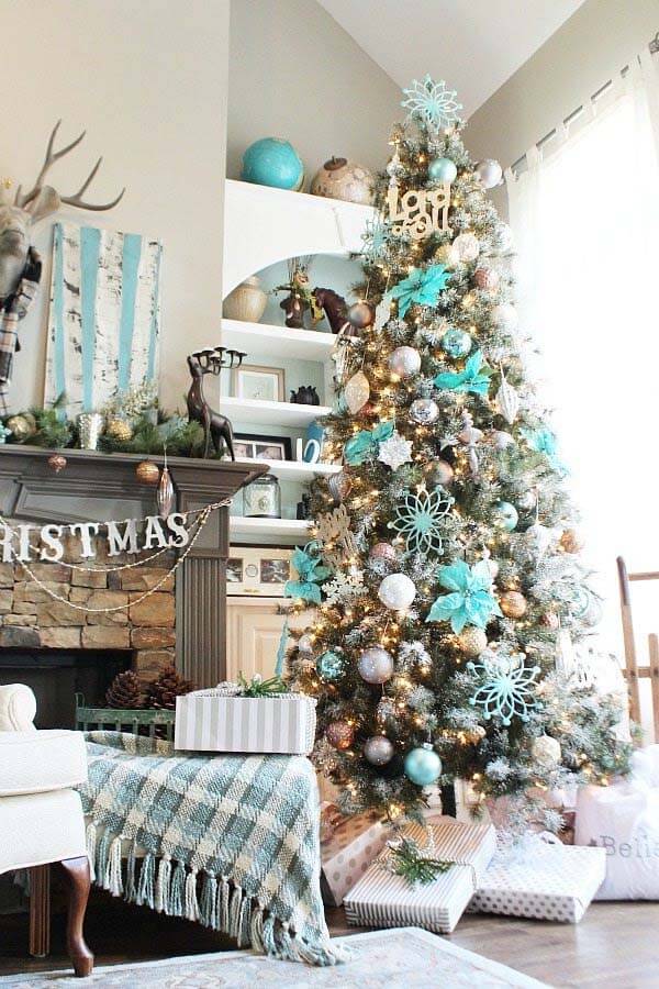Decoration of the living room for Christmas in turquoise and silver