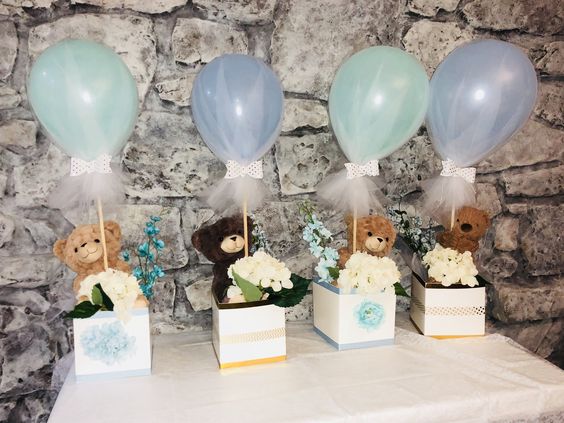 Table centerpieces with balloons and tutus