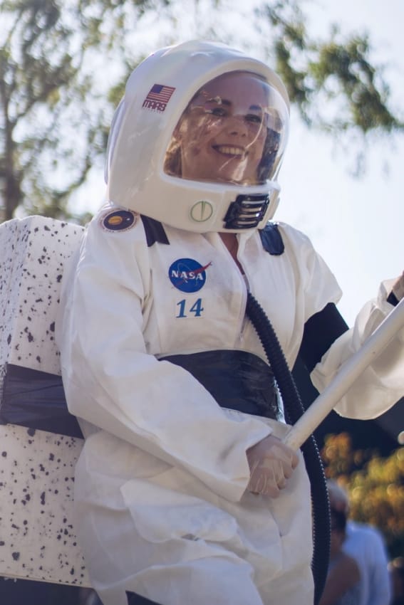 female astronaut costume with overalls and helmet