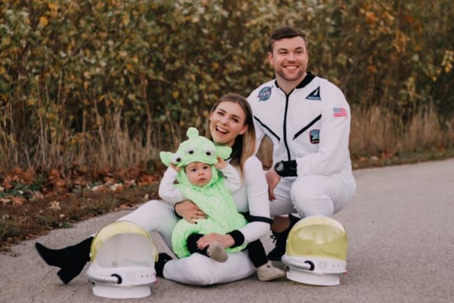 family costume with astronaut