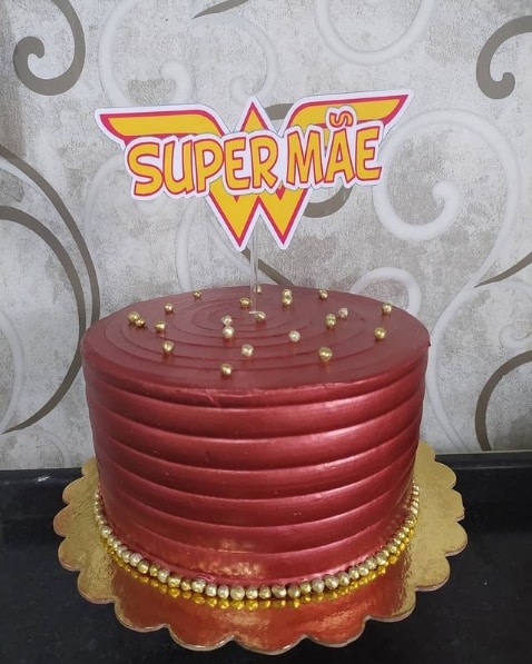 red mother's day cake with super mom top