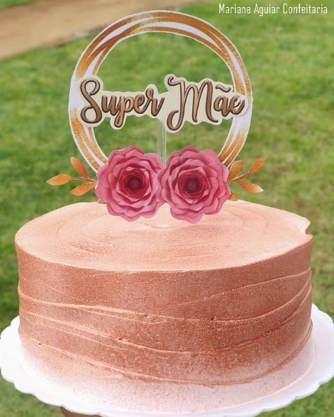 rose gold cake with super mae top