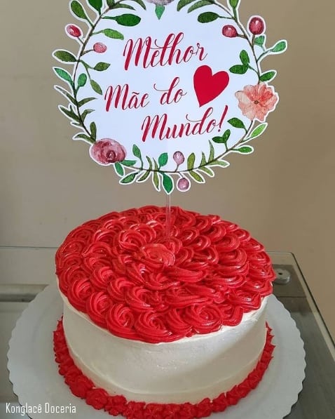 red and white cake with the world's best mom top