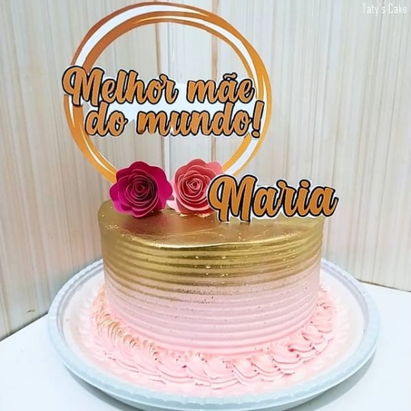 pink and gold cake with the world's best mother top