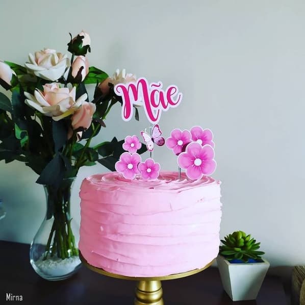 pink cake with mothers day top