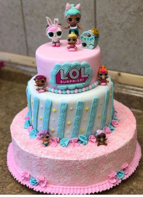 cake decorated with dolls
