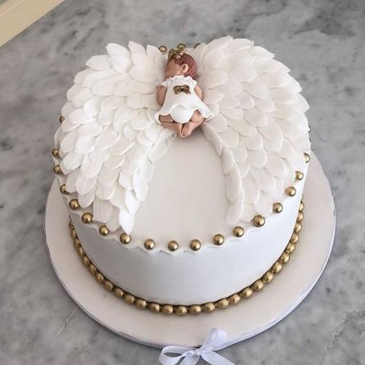 Christening decoration: Cake with angel