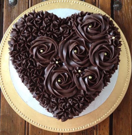 Heart cake decorated with chocolate