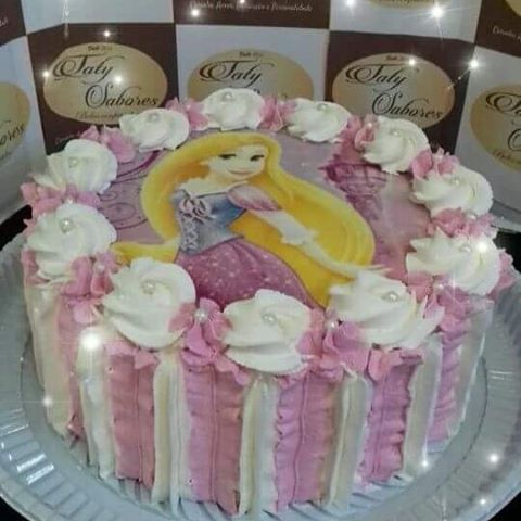 Rapunzel cake with whipped cream and rice paper