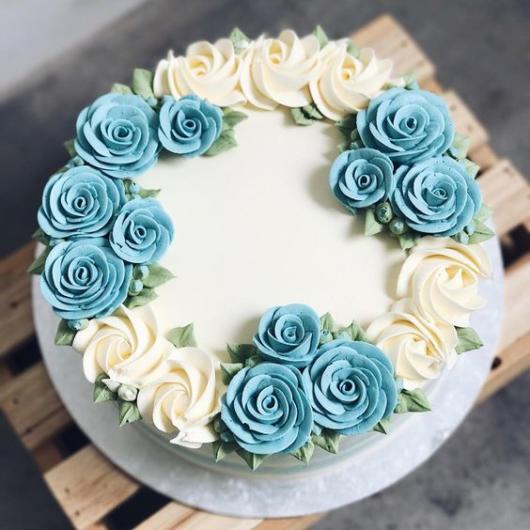 cake with blue roses