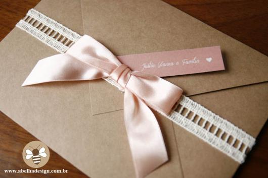 Pink bow kraft paper invitation envelope