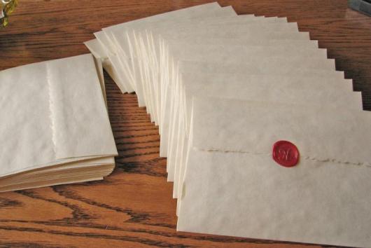 Simple white invitation envelope with wax seal