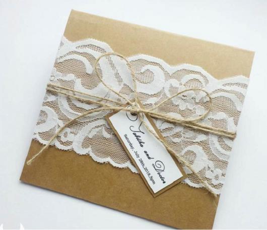 Rustic wedding invitation envelope with white lace