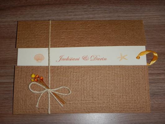 Rustic wedding invitation envelope with buttercup