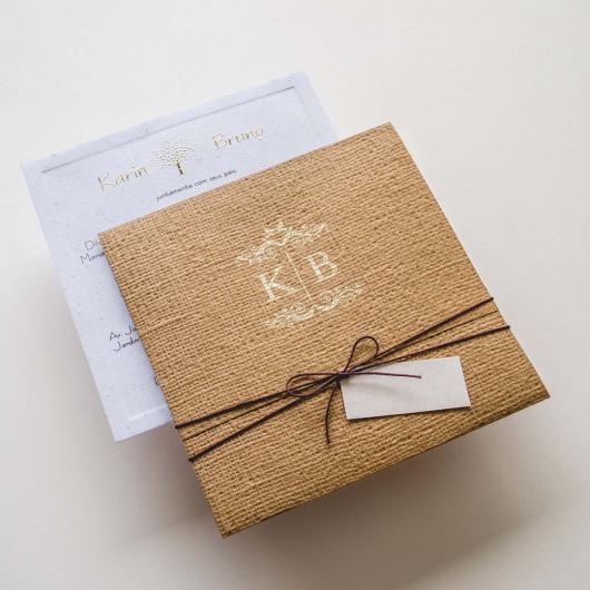 Rustic wedding invitation envelope with the bride and groom's initials