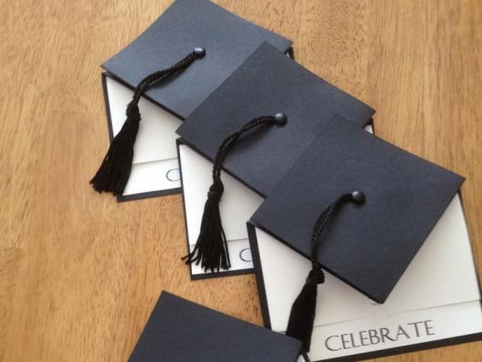 Graduation invitation envelope with graduation cap shape