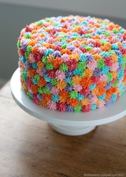 Simple colorful cake decorated with spout
