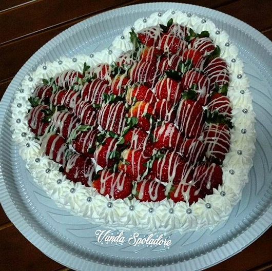 heart cake decorated with whipped cream