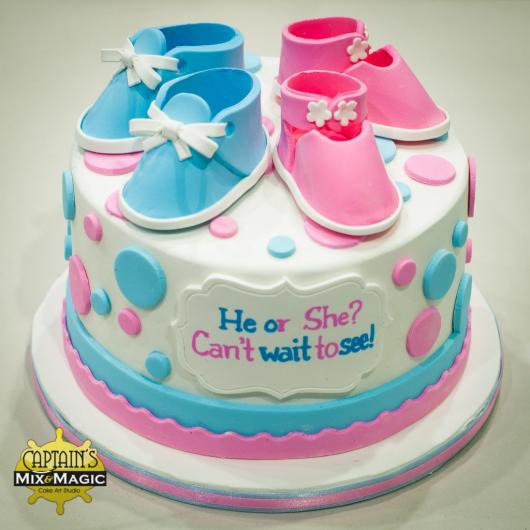 Decorate the cake with pink and blue slippers