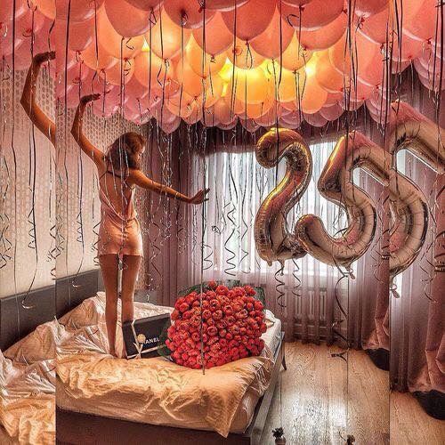Golden number balloons in decoration for Valentine's Day