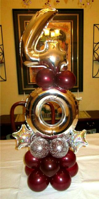 Number silver balloons in balloon sculpture