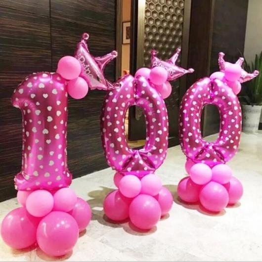 Pink number balloons in party reception decoration