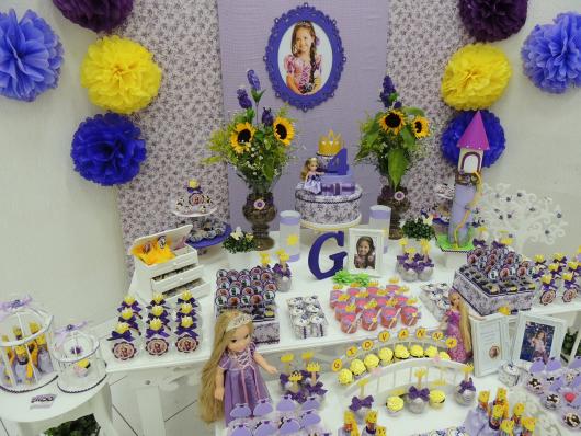 Provencal Rapunzel party decorated with crepe paper flowers and MDF panel with photo