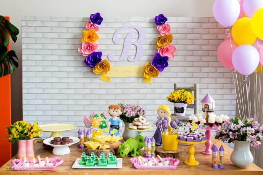 Simple Rapunzel party decorated with paper panel and felt characters