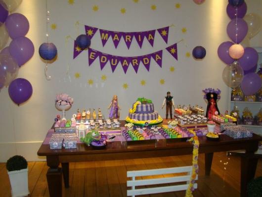 Simple Rapunzel Party Decorated With Rustic Table Balloons And Line Clothesline