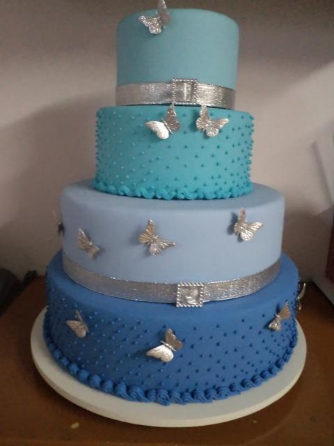 fake blue biscuit cake with butterflies