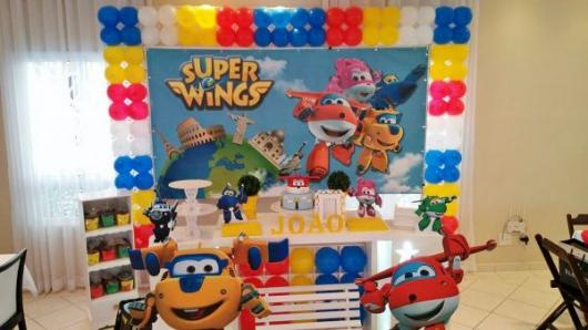 Provencal Super Wings Party Decoration with yellow, red and blue balloons