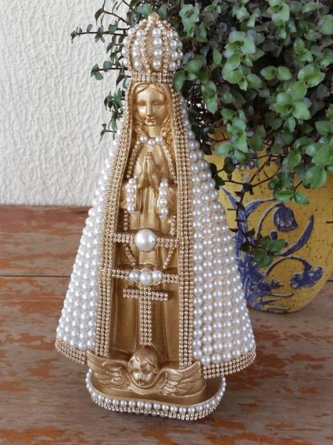 Souvenirs for godfathers of holy baptism decorated with pearls