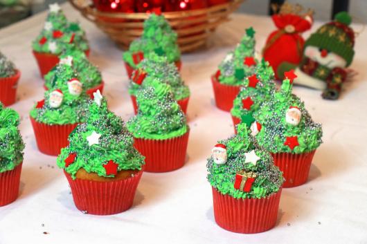 Christmas cupcake decorated with whipped cream tree