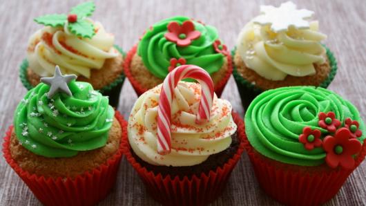 Christmas cupcake decorated with green and white whipped cream