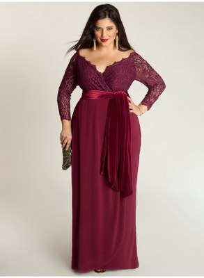 Model wears long burgundy dress with v-neck.