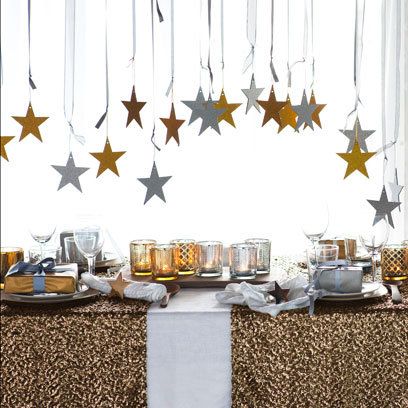Simple New Year decoration with stars on the ceiling