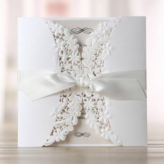 Simple white arabesque engagement invitations