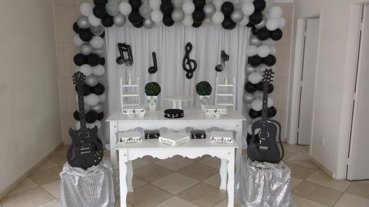 Themes for 18th birthday party musical notes on the curtain