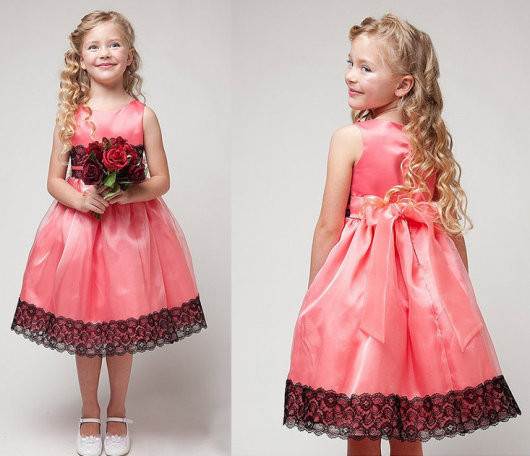 Pink children's dress with lace on the hem