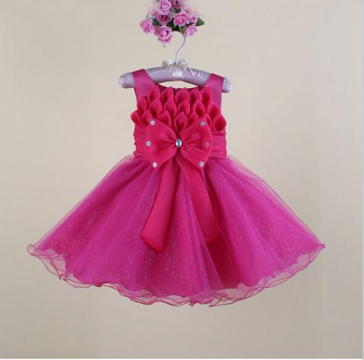 Children's dress with bow and petal detail