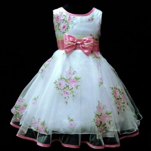 White children's dress with rose print