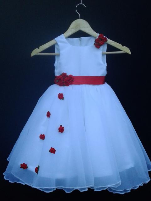 Children's blue dress with flower detail