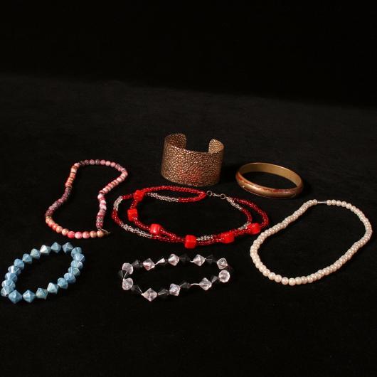 Stone and pearl bracelets and necklaces for 60s costumes 