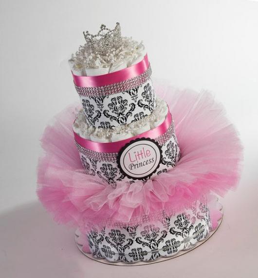 fake feminine cake with pink tulle, princess crown and rhinestones