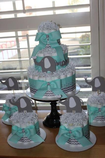 masculine fake cake with light blue bows and gray elephant designs