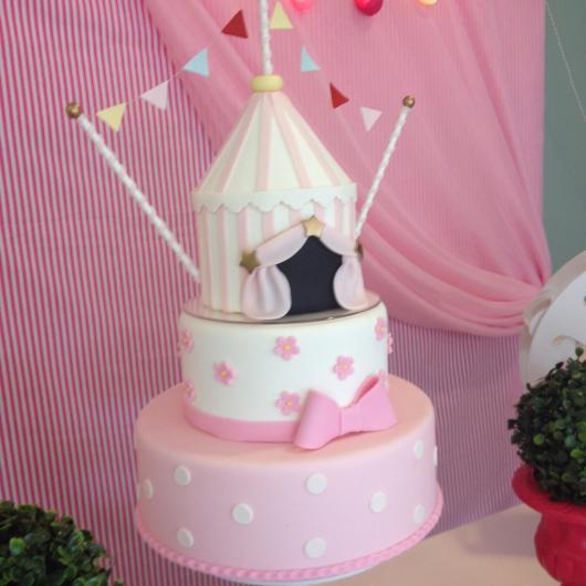 fake pink and white circus cake with tent