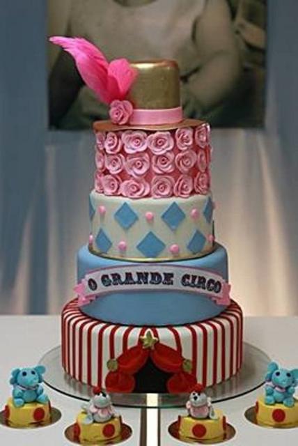 circus theme decorated cake with flowers and top hat