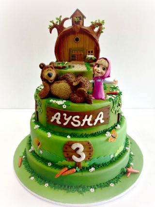 Four-tier cake, with the birthday girl's name, age and characters.